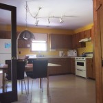 Clean kitchen with sunlight through window