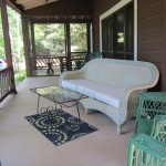 Wicker furniture on spacious porch
