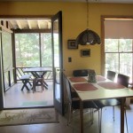 kitchen table with porch in background