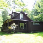 Brown house with white shutters