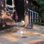 deck with table and chairs