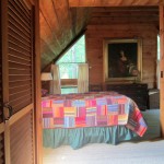 cathedral bedroom with pine walls