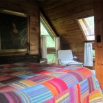 cathedral bedroom with pine walls